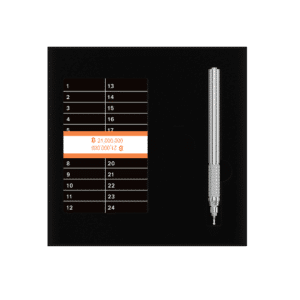 Open Yokis kit showing 24-word seed phrase plate and precision electric engraver for secure Bitcoin backup.