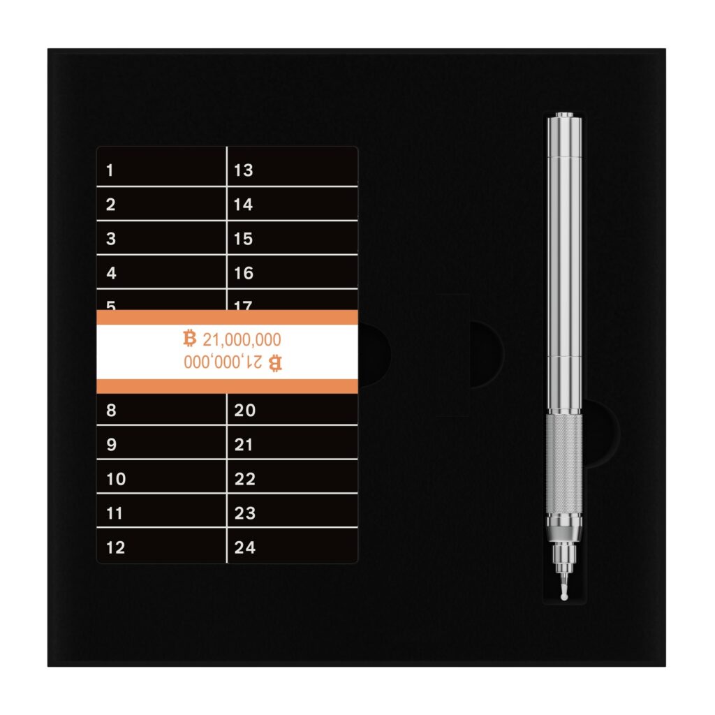 Yokis kit opened to display engraved seed phrase plate and compact electric engraver for Bitcoin protection.